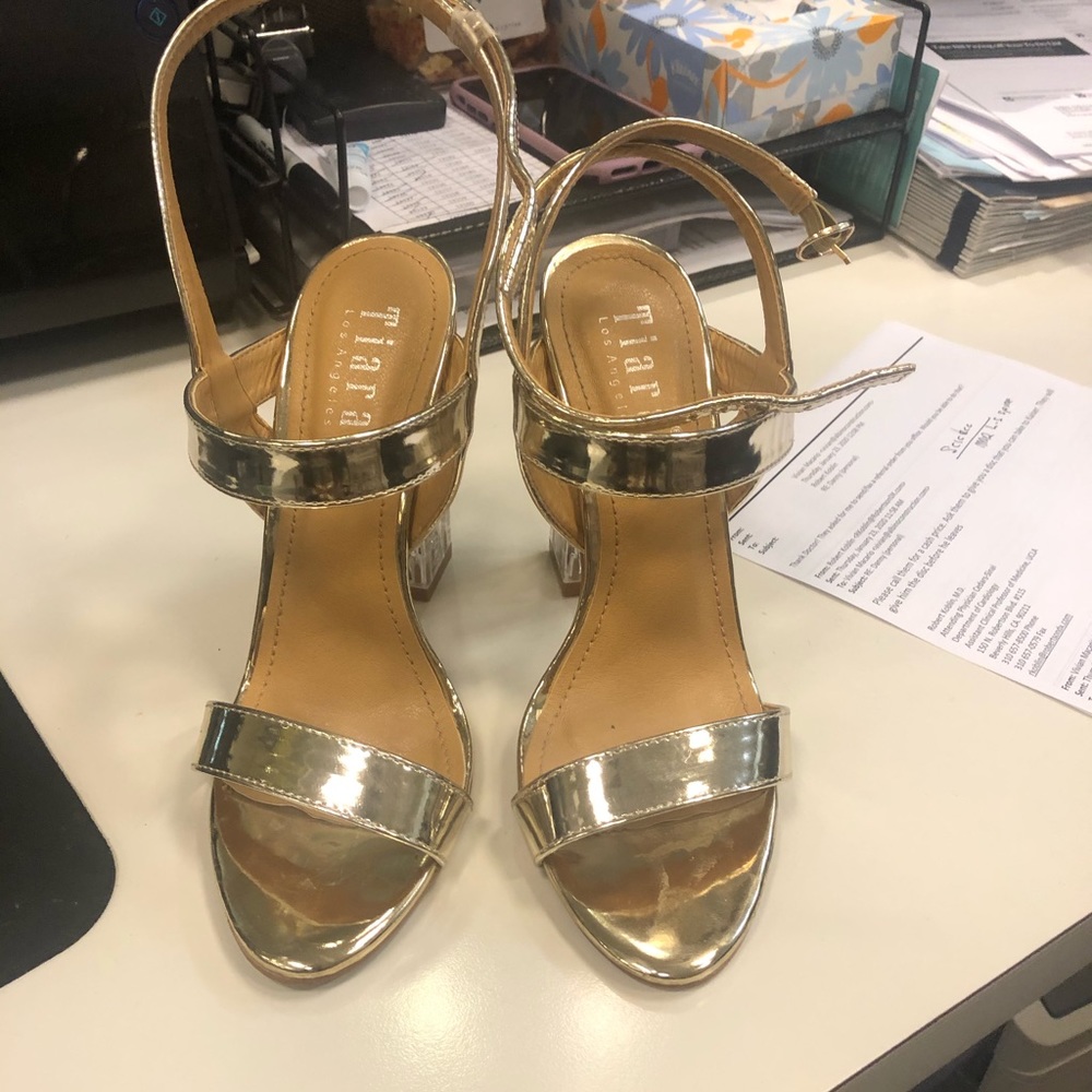 Shiny gold 5 inch clear heels